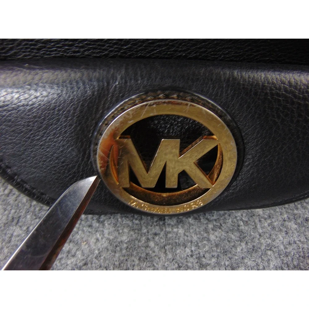 Michael Kors notice wear